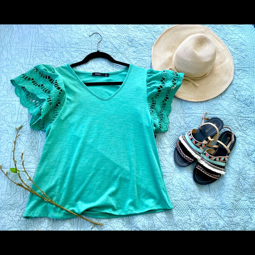 Cure size small green top. NWT